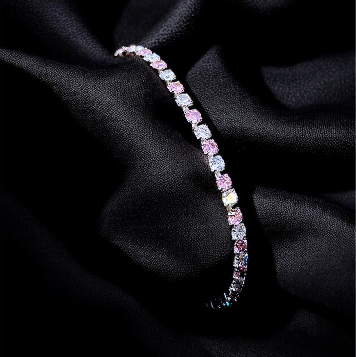 Multicolored beaded bracelet on a black fabric background