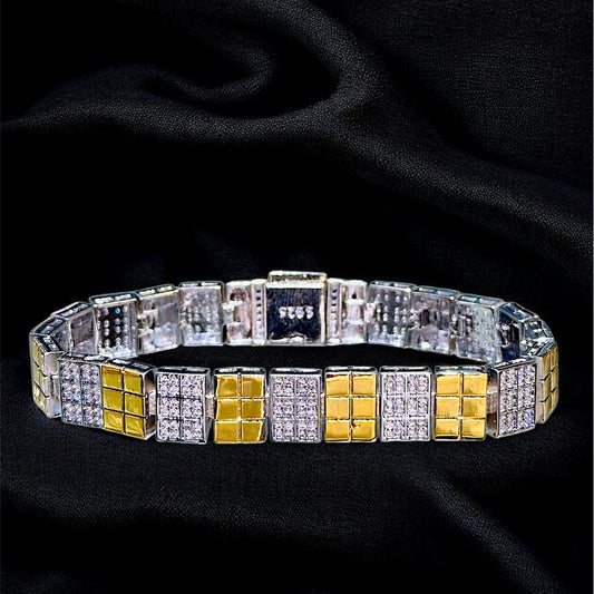 Bracelet with alternating yellow and silver square beads on a black background
