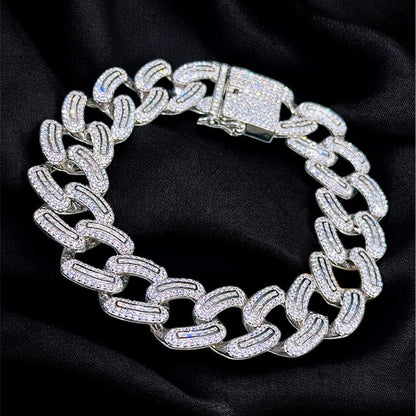 Silver chain bracelet on a black background