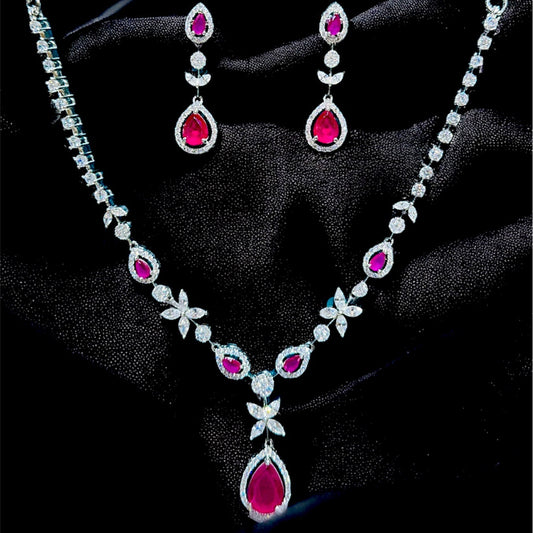 Jewelry set with necklace and earrings on a black background